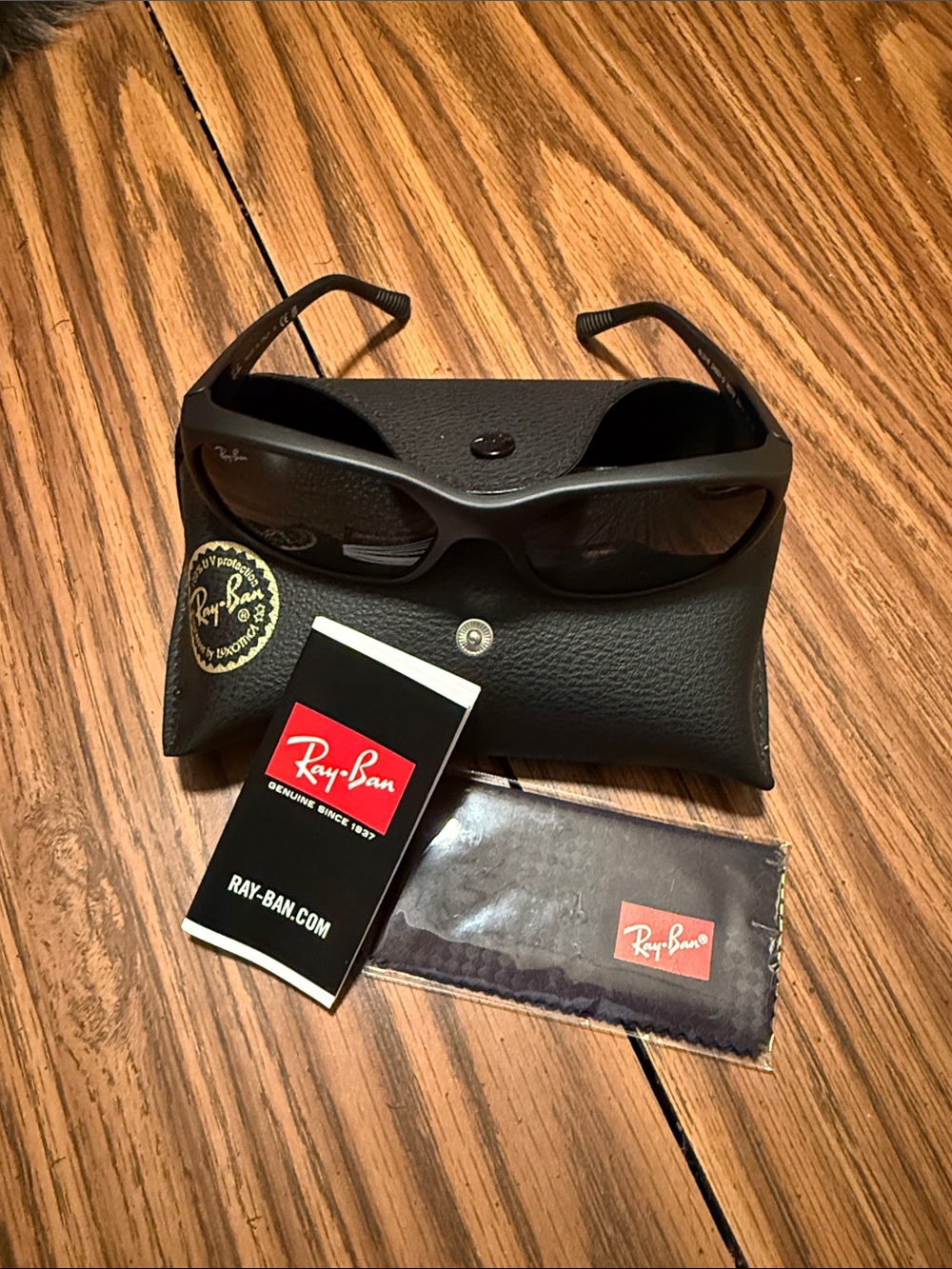 Ray-Ban Black Sunglasses with Dark Lenses and Case. New never been worn.